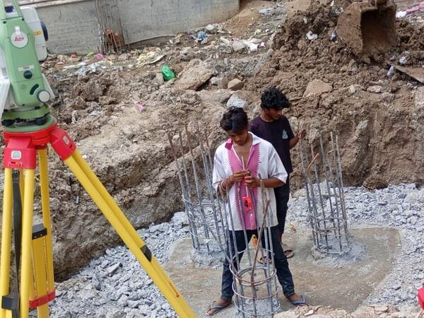 Field team recording foundation levels
