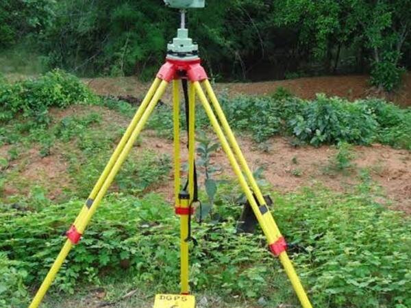 GNSS receiver set up over a control point